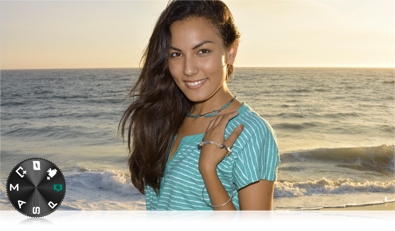 Portrait of a woman on the beach at sunset and inset of the camera's control dial
