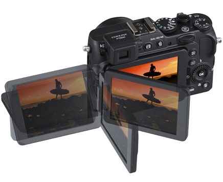 Composite photo of the COOLPIX P7800's Vari-angle LCD and the photo of the surfer in silhouette