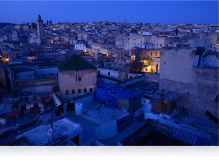 photo of a city at night, in low light