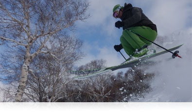 Photo of a skiier jumping in air over snow highlighting Motion Detection